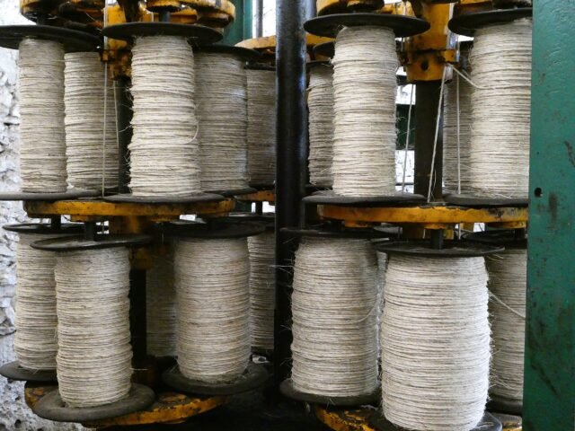 Spools of sisal yarn in a spinning mill