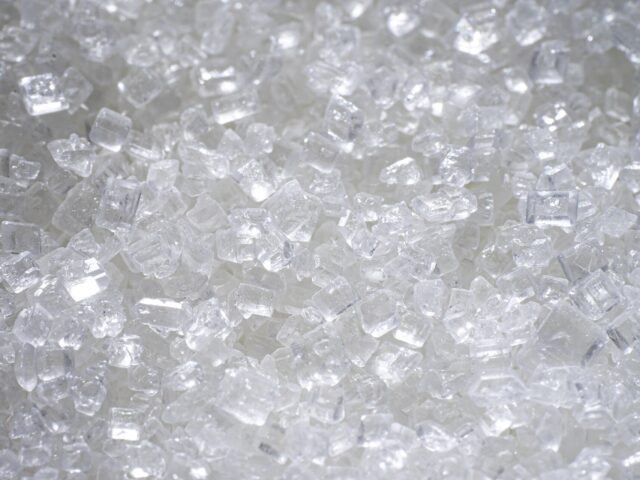 White refined sugar crystals close up